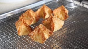 Crab Rangoon is so yummy is a must whenever you order Chinese food! Make your own with this air fryer crab Rangoon recipe.