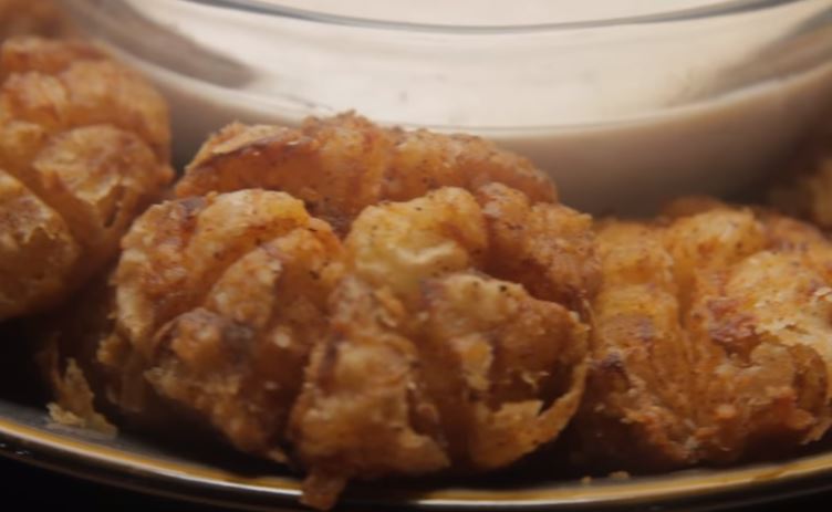 Looking for the perfect party appetizer? Then check out this vegan air fried mini blooming onions! Perfect to satisfy those who love fried foods.